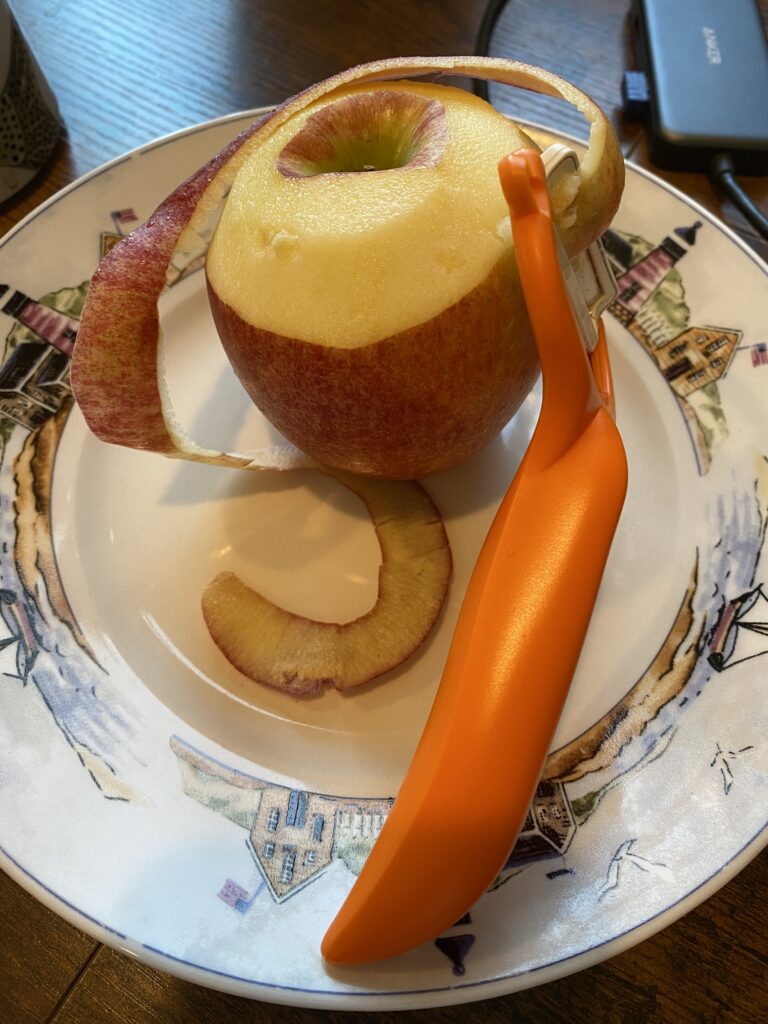 kyocera apple peeler with ceramic blade peeling in progress